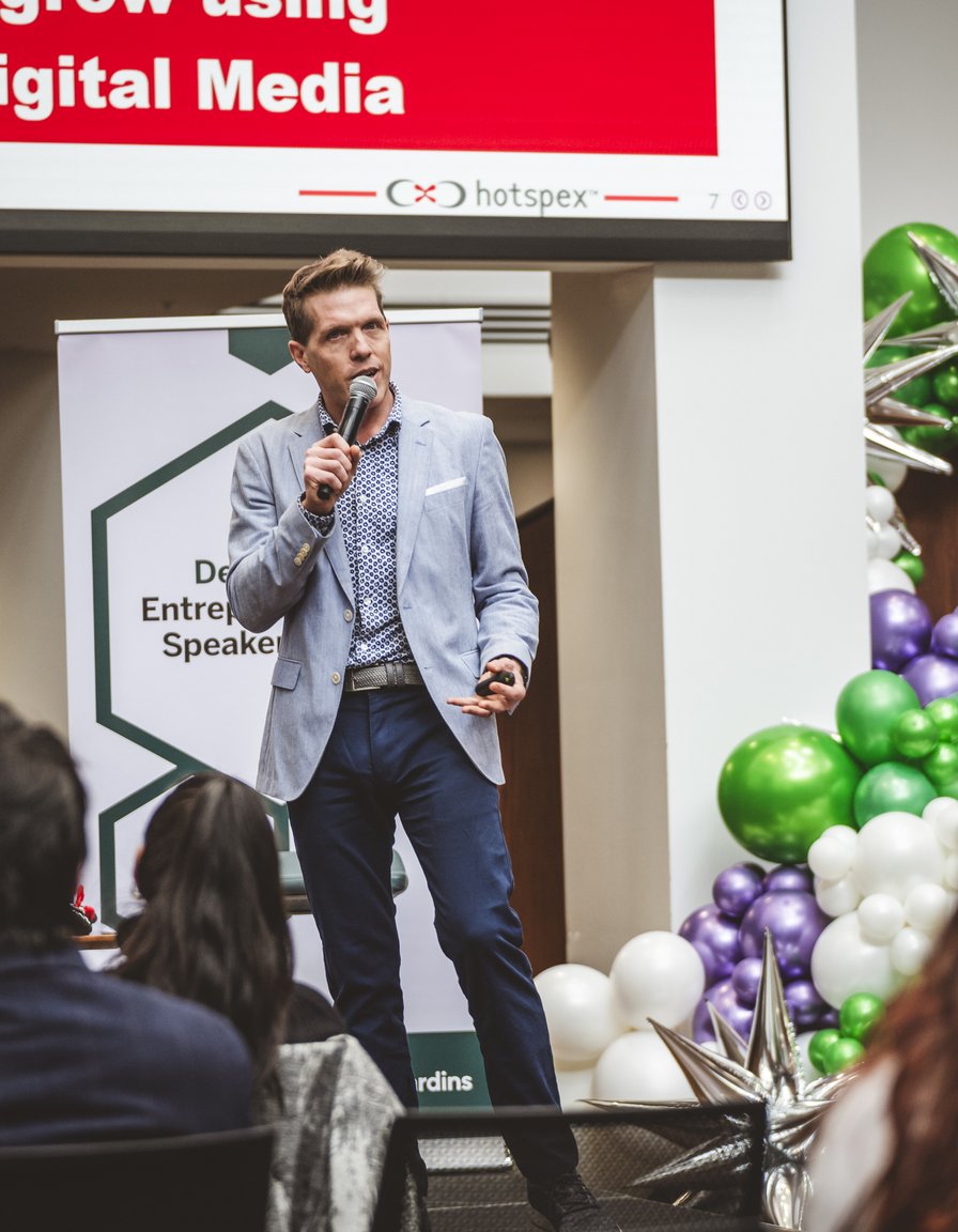 Shane Skillen on stage at the Desjardins Entrepreneurship Speaker Series, Ivey Business School